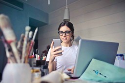 Smiling client communicating with attorney using mobile app