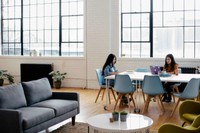 People working together at a desk for legal technology comparison between Quilia and Finch