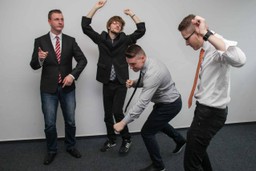 Lawyers celebrating the superior features of Quilia over Case Status in client management